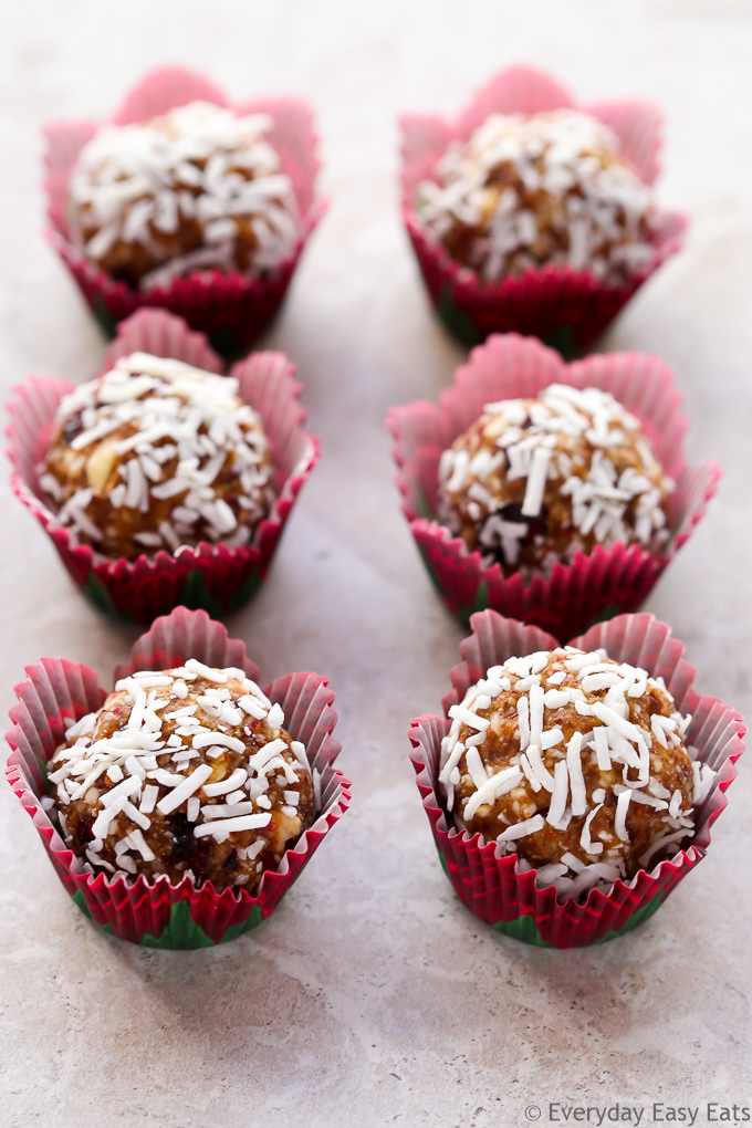 Overhead view of Cranberry Coconut Energy Balls on a neutral background.