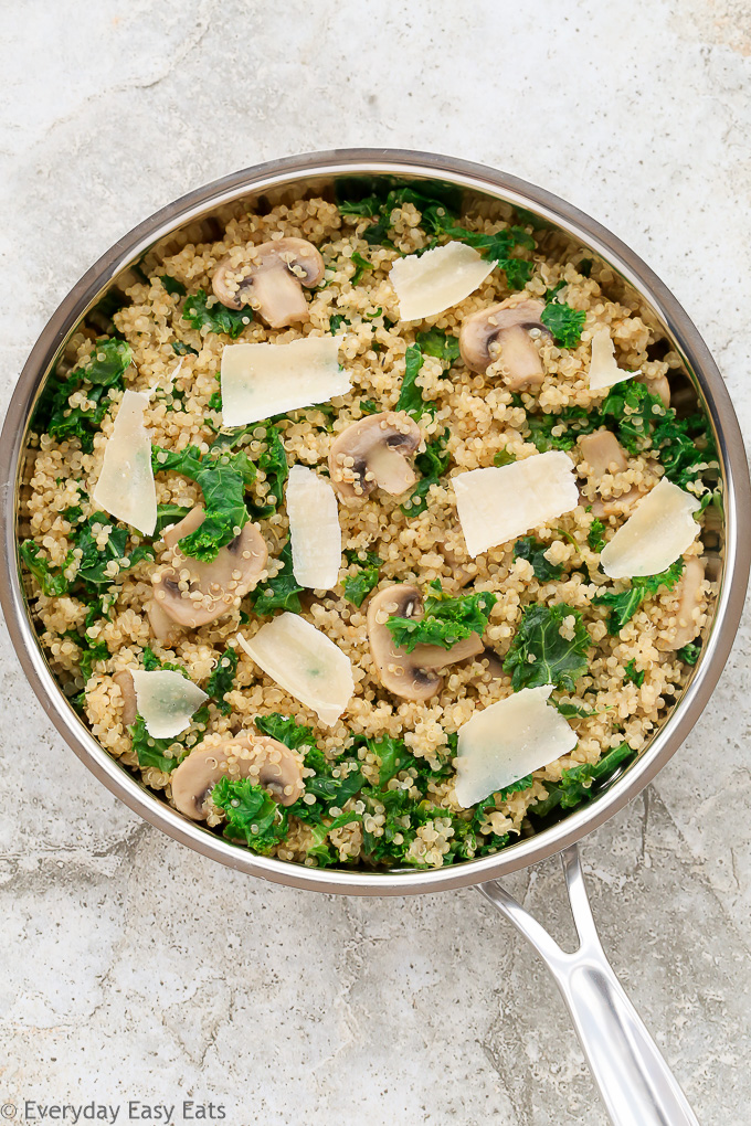 Overhead view of Mushroom Quinoa in a skillet on a neutral background.