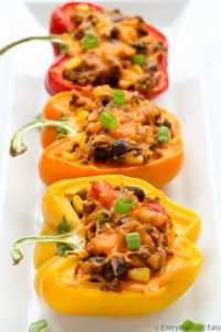 This Mexican Stuffed Peppers recipe is so zesty and full of flavor. A comforting all-in-one meal that is hearty, healthy and gluten-free! | EverydayEasyEats.com
