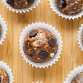 Close-up overhead view of Peanut Butter Energy Balls on a wooden background.