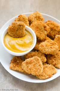 Baked Chicken Nuggets with Honey Mustard Sauce | EverydayEasyEats.com