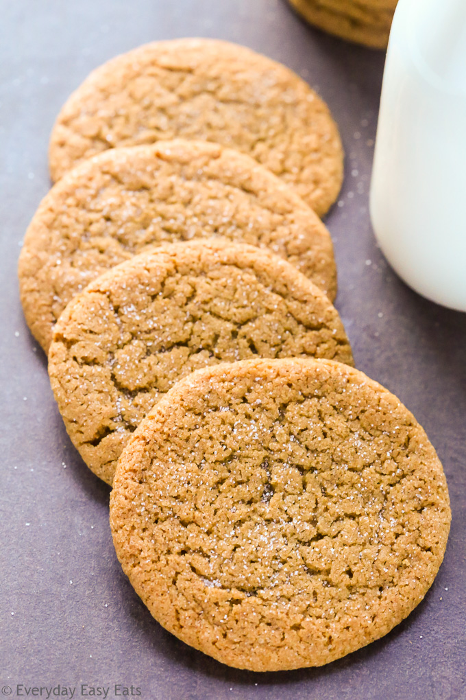 Close-up overhead view of Molasses Cookies Without Brown Sugar on a dark background.