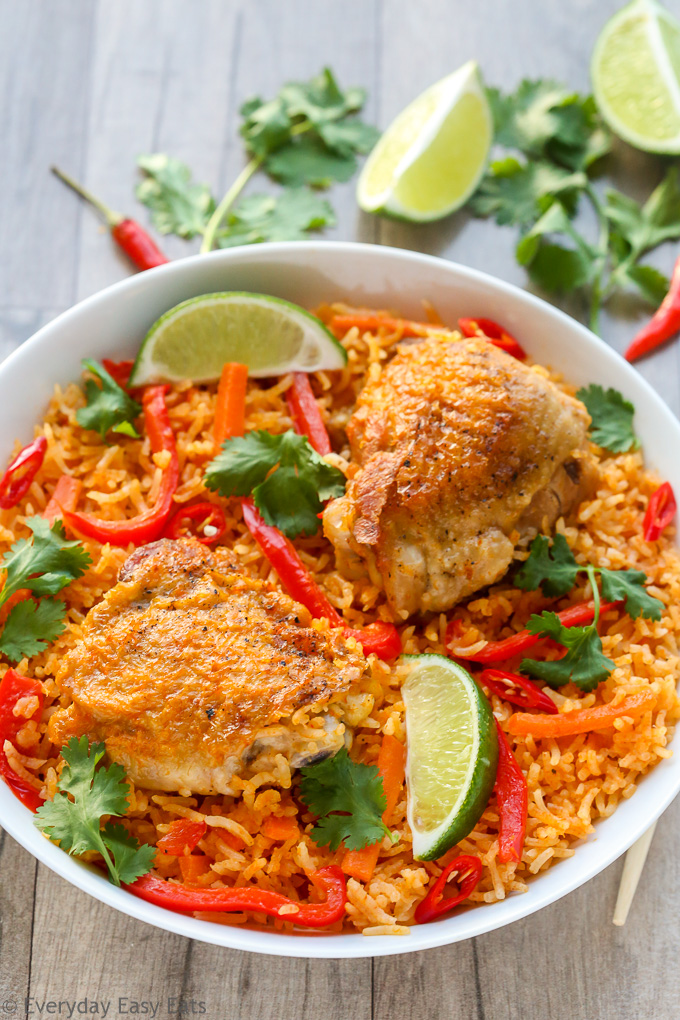 Close-up overhead view of Thai Chicken and Rice in a white bowl.