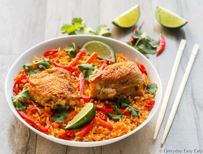 Side overhead view of Thai Chicken and Rice in a white bowl.