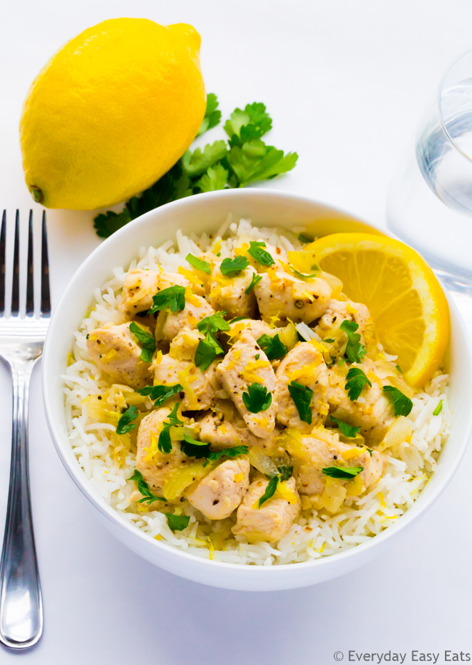 Overhead view of Chicken Scampi Without Wine in a white bowl on a white background.