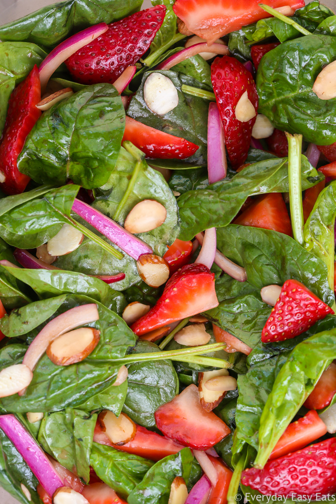 Very close-up view of Strawberry Spinach Salad with Balsamic Dressing