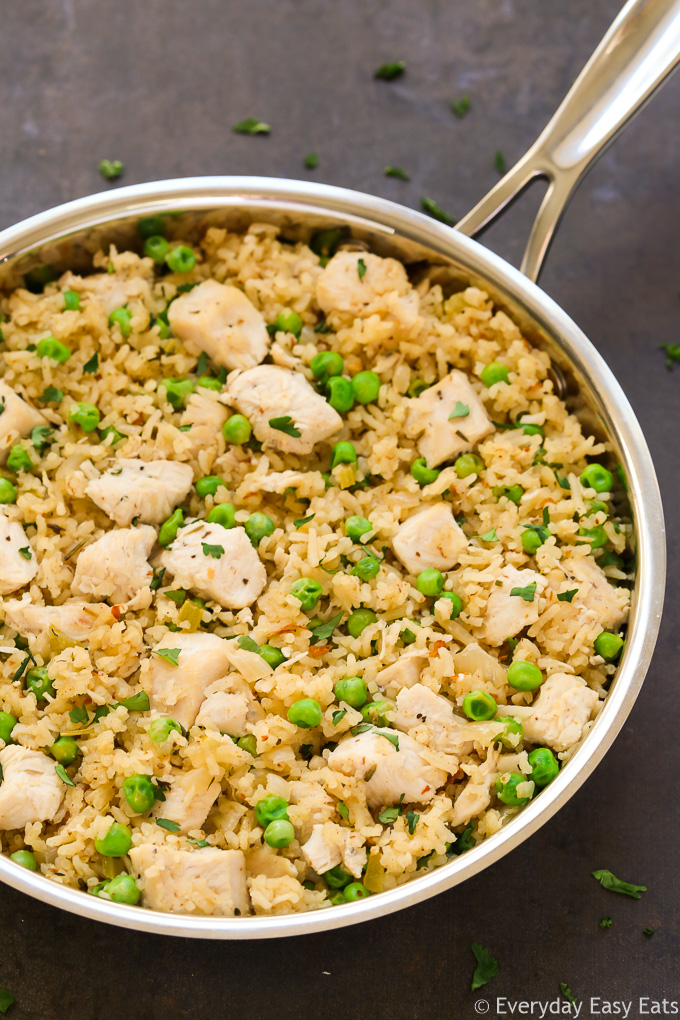 Overhead view of One-Pan Chicken and Rice in a silver skillet.