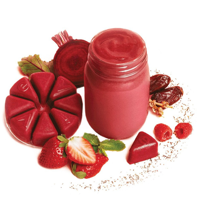 The Best Organic Smoothie Delivery Services: Red smoothie with smoothie cubes on the side.