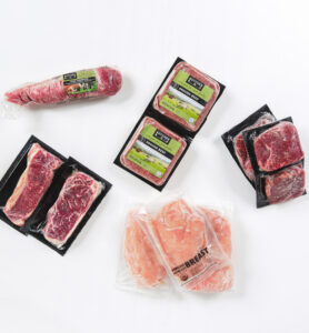 ButcherBox Review: Overhead view of ButcherBox frozen meat packages