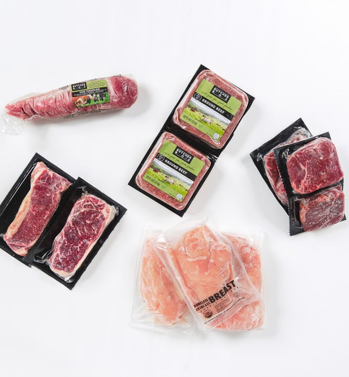 ButcherBox Review: Overhead view of an assortment of ButcherBox frozen meat packages